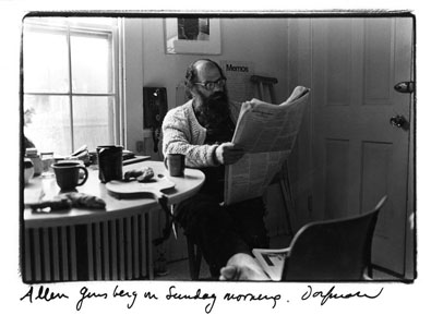 photo of Ginsberg reading newspaper