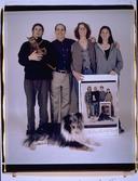 Family with cat, dog and portrait